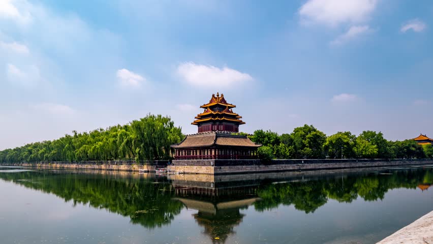 Daytime panoramic timelapse of the historic Forbidden City and its iconic Corner Tower in Beijing, China.