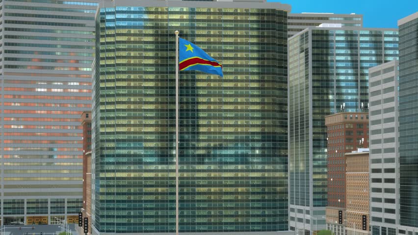 Democratic Republic of the Congo Flag on Pole, Modern Business District Buildings - Daytime View