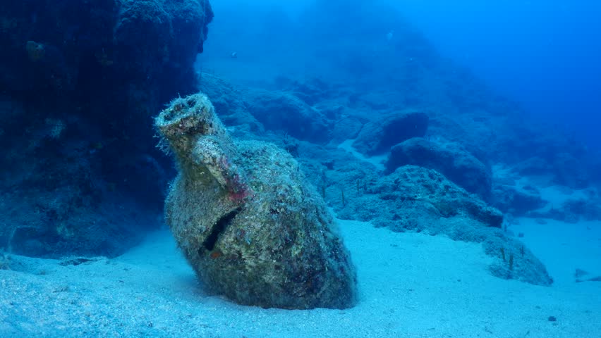 amphora pieces underwater ancient antic amphoras scuba divers exploring and discovering deep water