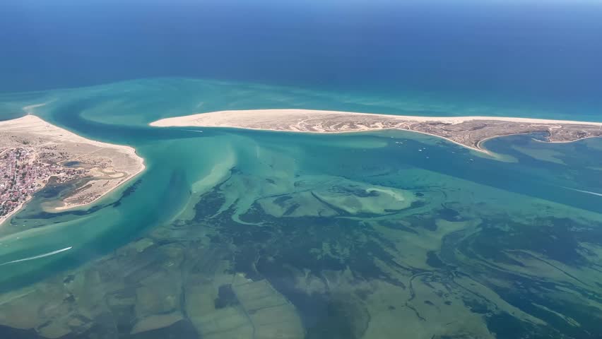 Flying over Faro coastline in Portugal
