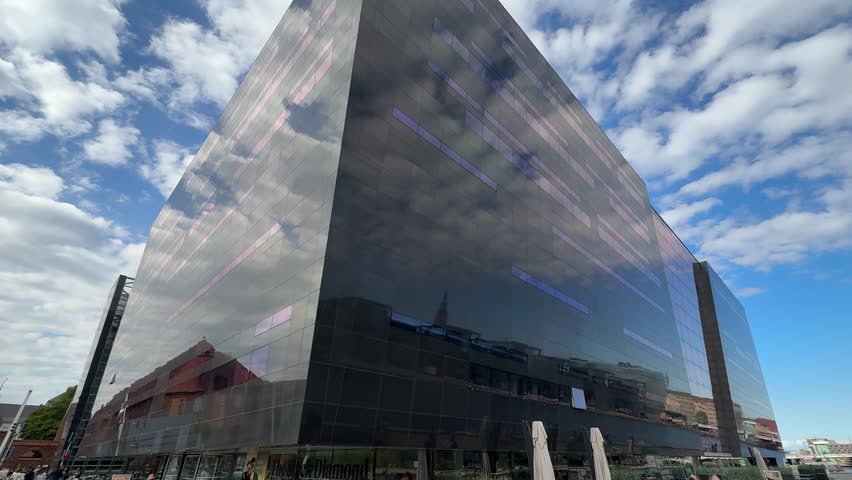 Modern glass facade of Black Diamond Royal Library in Copenhagen city, Denmark