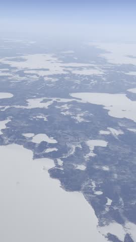 Flying over a frozen lake in Manitoba, Canada