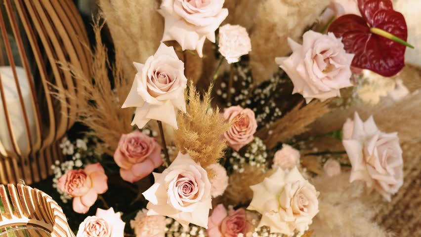 Wedding arch flowers with pampas grass and floral arrangement. 4K slow motion.