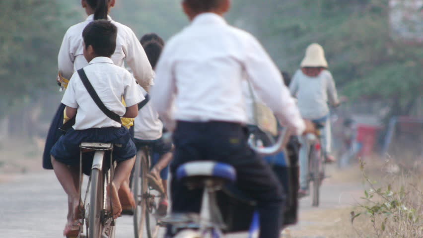 Children riding to school in Cambodia