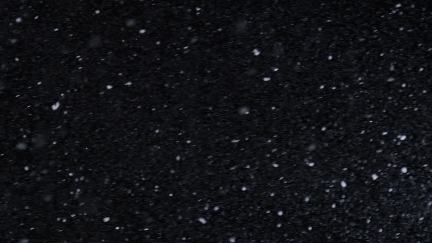 Falling snow with realistic seasonal mood. Falling snow on isolated matte. Natural particles create falling snow effect. Slow motion reveals falling snow texture.
