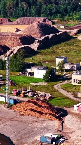 Vertical social ratio aerial video of a mining site in Riga, Latvia. Produced in 1080x1920 and with Rec709 color.