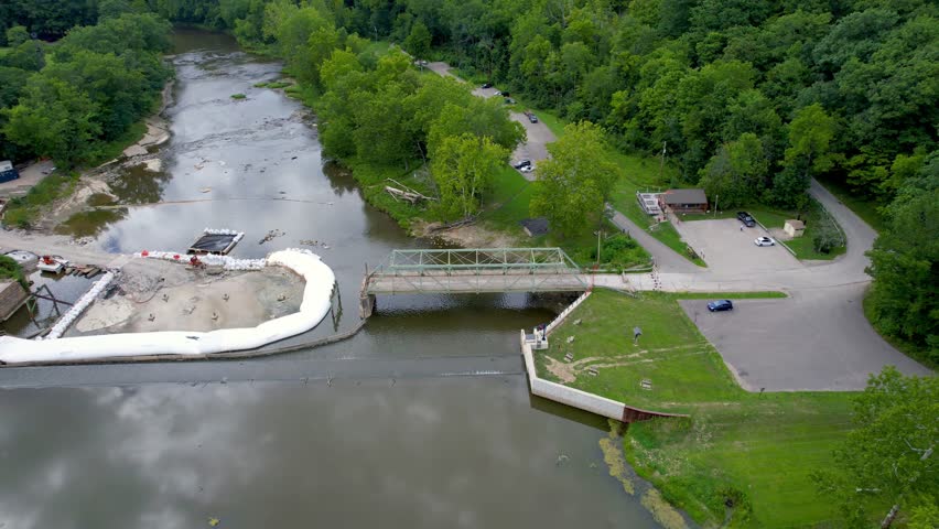 Drone view of a dam and bridge project to restore natural river flow and fish passage in Ohio.