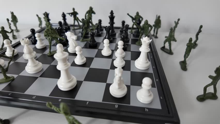 Toy Army Soldiers Surrounding Chess Pieces on Board