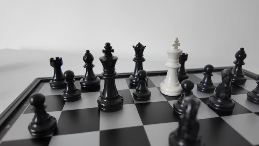 Black and White Chess Pieces Close Up on Board