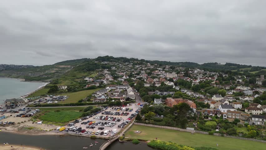aerial View of Charmouth Coastal Village and Beach Parking on Jurassic Coast in Dorset England