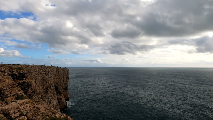 SAGRES, PORTUGAL - MARCH 12, 2026: Lighthouse of Cabo de São Vicente stands above rugged Atlantic cliffs creating dramatic maritime landscape with panoramic ocean views in Sagres, Portugal