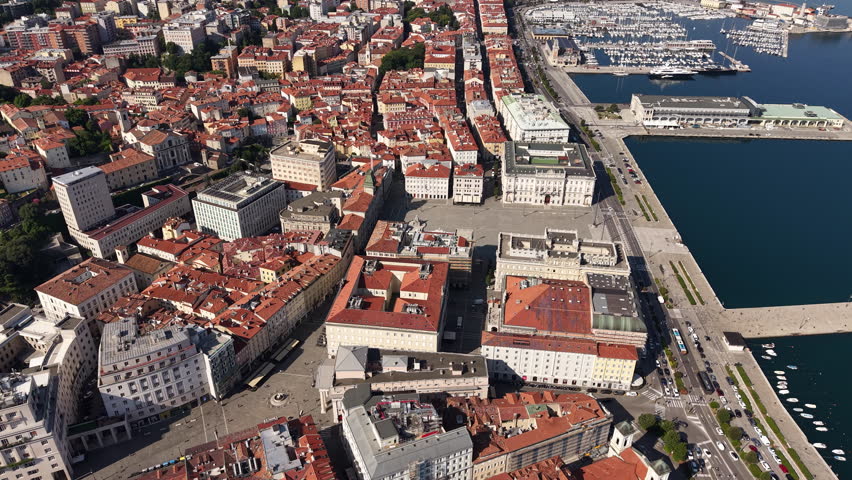 Drone Shot of Trieste City Center, Old Town Buildings and Coastal Traffic, Italy