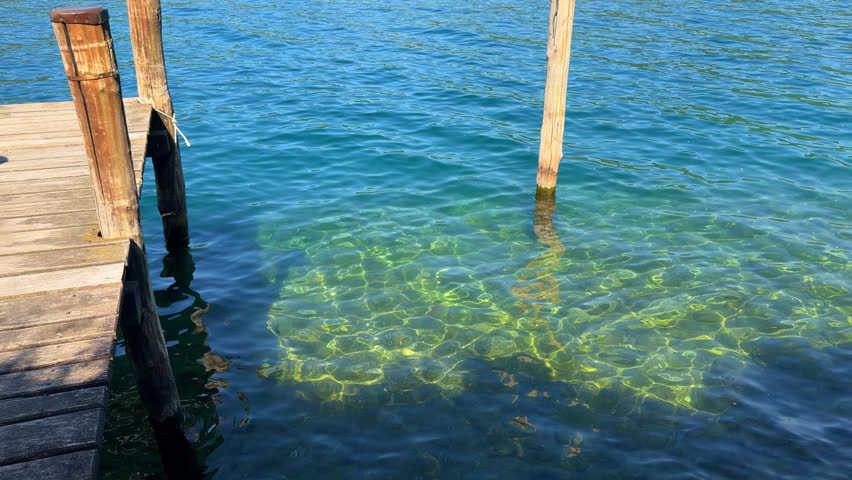 wooden pier and island in the lake	