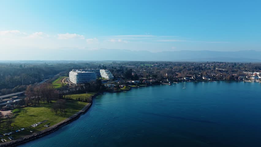 Aerial view of the modern Lombard Odier headquarters building situated along the shore of Lake Geneva in Bellevue, Geneve, Switzerland.