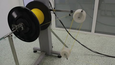 reel with fiber optic cable on winding machine