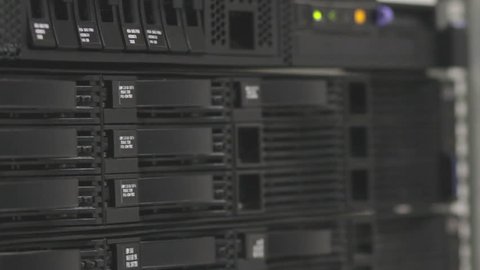 servers stack with hard drives in a datacenter for backup and data storage