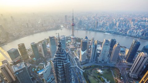 Shanghai from day to night, time lapse. 
Aerial view of high-rise buildings with Huangpu River in Shanghai, China.
-  >>> Please Search Newest Featured Clip: 1020262945.