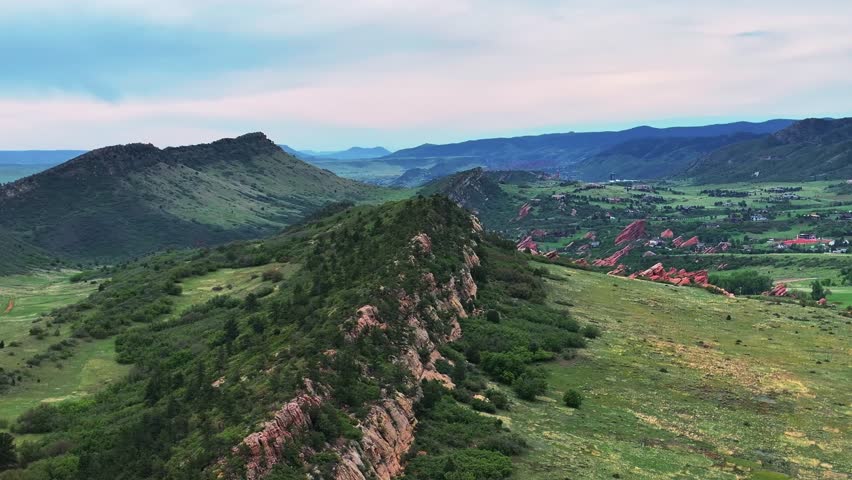 Red Rocks of Deer Creek Canyon South Valley trail Ken Caryl Valley Ranch aerial drone Denver Colorado Front Range foothills Lockheed Martin Roxborough Park summer sunny morning blue sky cloudy upwards