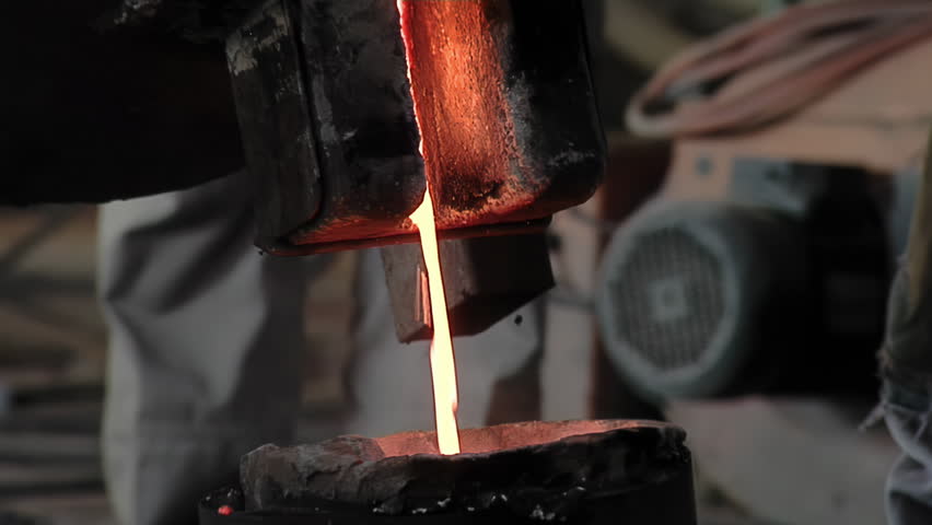 Pouring Molten Metal For Casting Process In Historic Church Bell Workshop - 4K