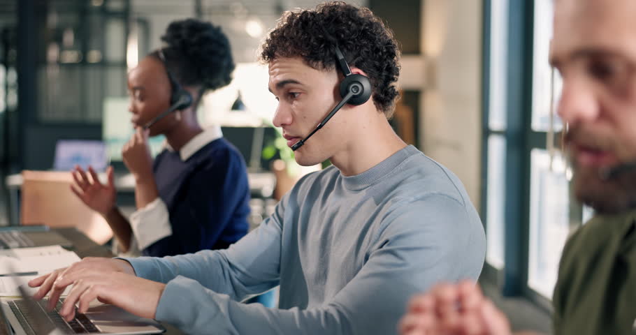 Call center, talking and man with business people for consulting, contact us and virtual assistance. Office, team and workers with headset on tech for customer service, online report and crm support