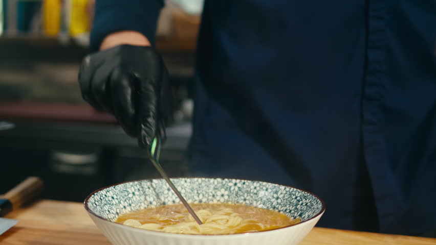 Japanese Ramen with Beef or chicken, rice noodles with fried meat, Tom Yam kung Spicy Thai asian soup, chef cooking in traditional korean chinese food. Close up of tasty vietnamese cuisine. 