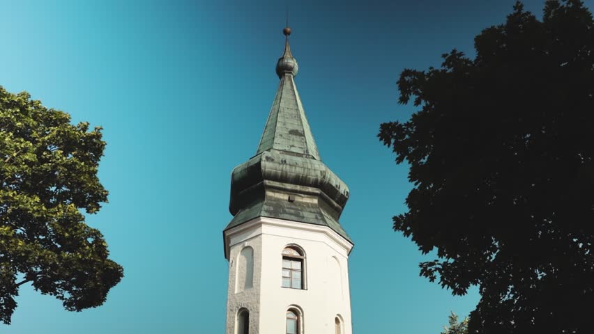 A tall tower with a clock on top.