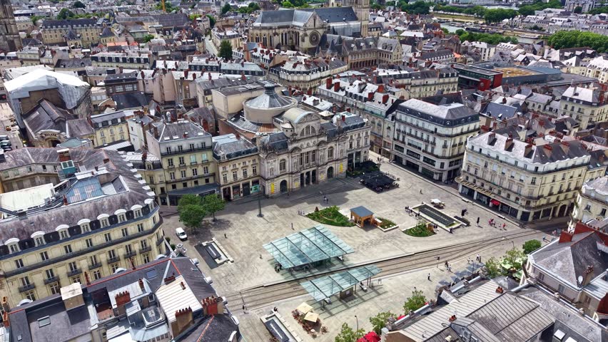 Place du Ralliement et Grand Theatre in Angers city. France. Aerial drone backward and cityscape