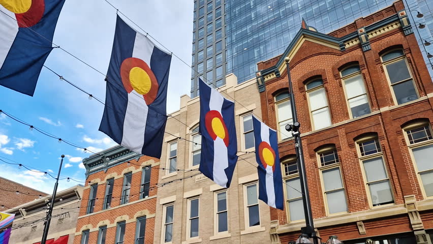 Colorado State Flags Hanging Above Larimer Square, Historic Downtown of Denver USA