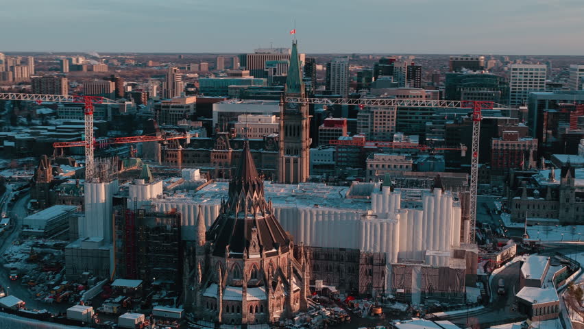 Spinning aerial view of parliament hill ottawa under construction