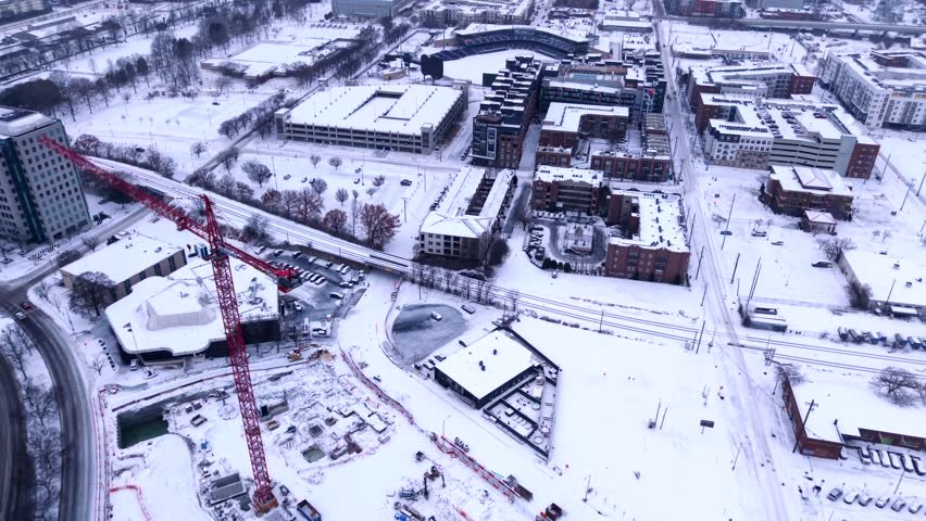 Drone footage of a snow covered Nashville neighborhood and streets blanketed in white following a winter storm in Tennessee