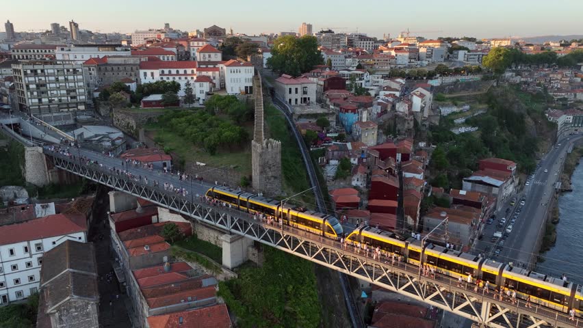 Metro Train on the Ponte Luis I Bridge in Porto City, Lisbon. Drone, 4k.