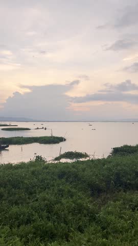 Boats on a Lake at Sunset