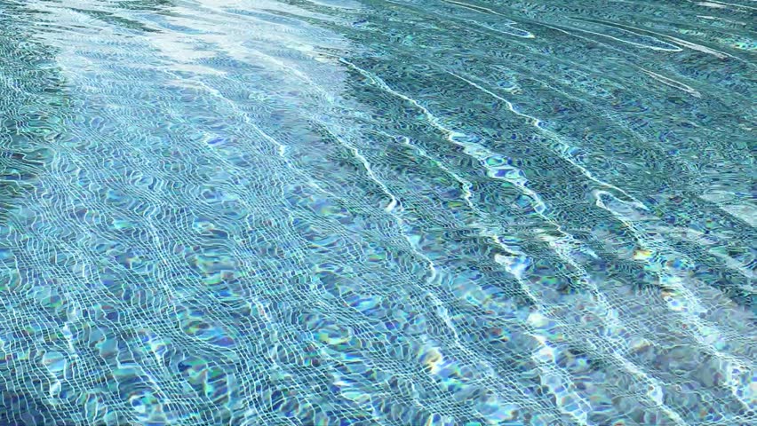 Swimming pool with blue crystal clear water surface and ripple wave background