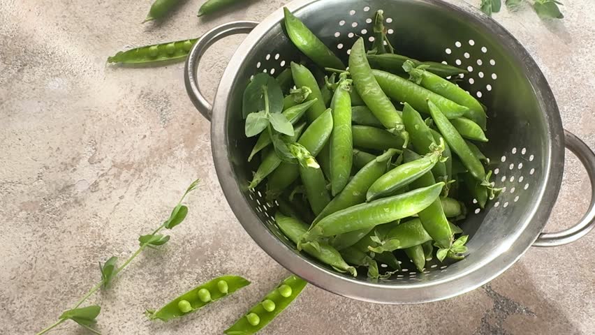 Fresh green peas and pods 