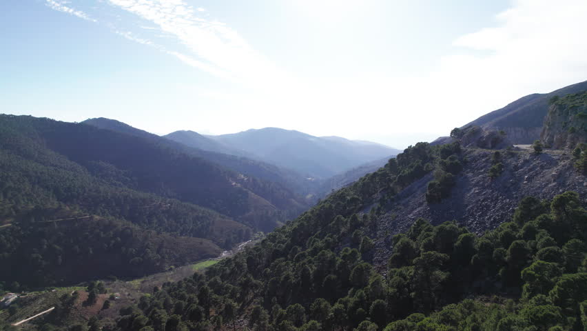 Aerial view of Igualeja valley, Andalusia, Spain, moving forward
