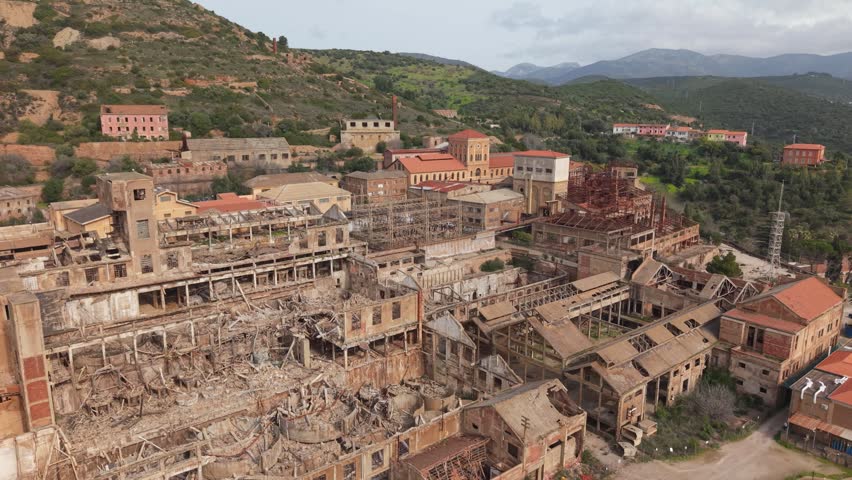 Ruins Of The Abandoned Monteponi Mine In Iglesias, Sardinia, Italy - Aerial Shot