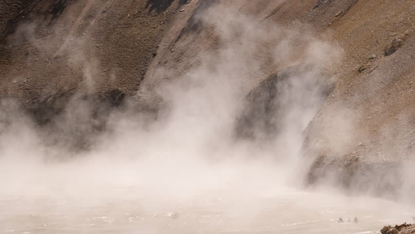 Steam Rising Mud Cauldron In Yellowstone National Park Wyoming, Close Up