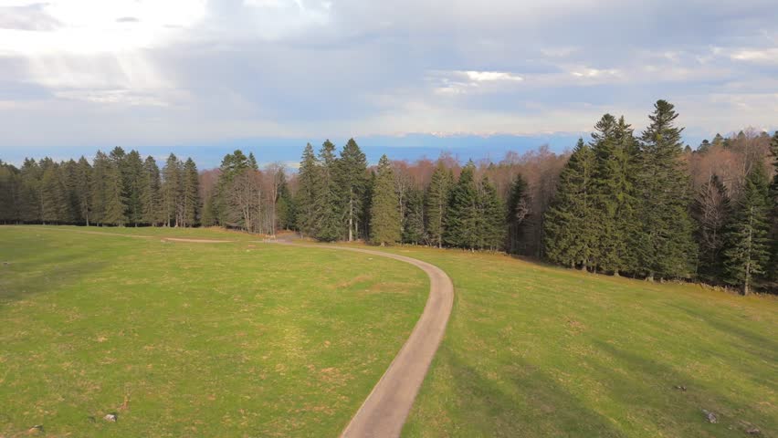 Aerial drone view of a path in the Jura mountains