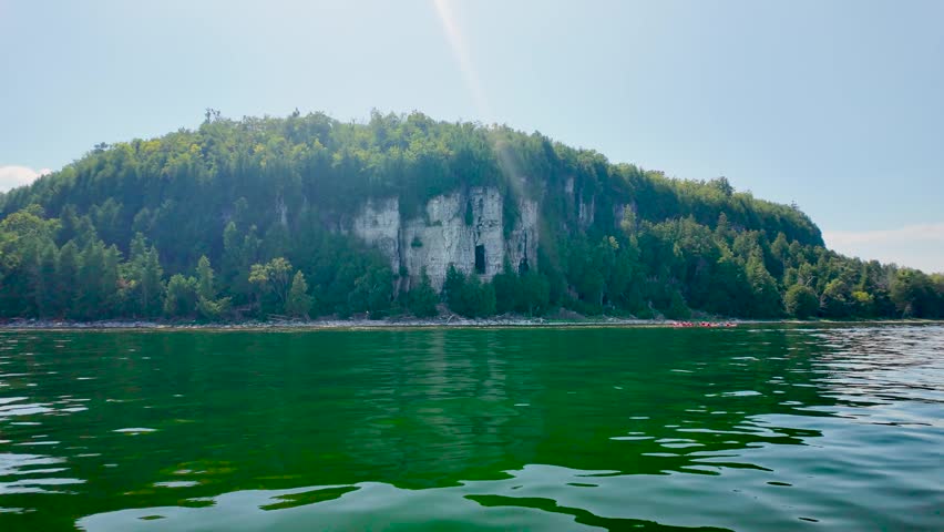 Cruising along Green Bay past Eagle Cave and the towering Niagara Escarpment near Nicolet Bay, revealing Door County