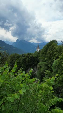 Chiesa di San Martino in Calonico, Switzerland church on a rocky spur overlooking the valley