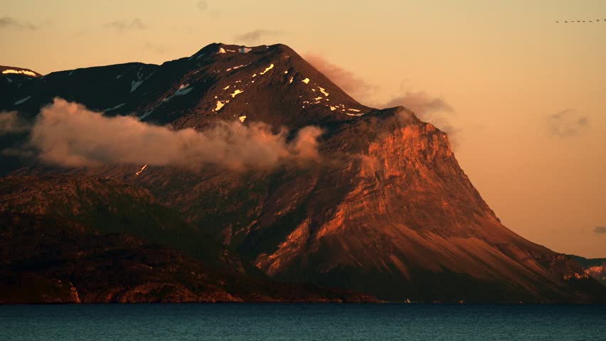 Sunset Reveals Mountain And Water Along The Norway Coast With Clouds