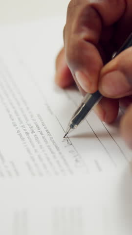 Hands, person and writing on document with contract, legal application and estate settlement. Title deed, paperwork and consent with letter for asset protection, inheritance beneficiary and testament