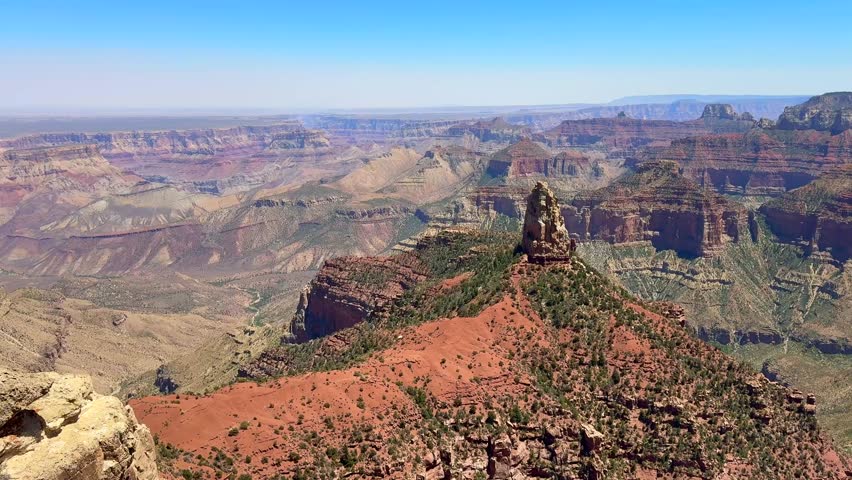 Scenic view of the North Rim of the Grand Canyon from the Point Imperial viewpoint. Panning left to right.