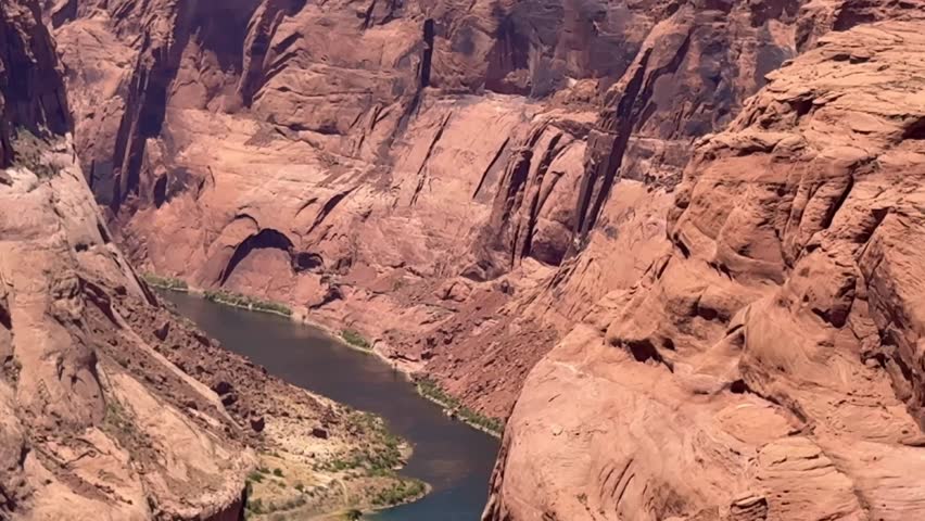 Scenic view of the famous Horseshoe Bend in the Colorado River in the Grand Canyon. Pulling back.
