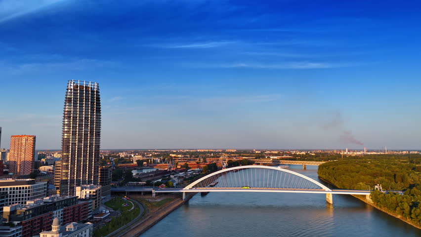 The Appolo Bridge over the Danube in Bratislava, Slovakia. Modern scenery of the city at sunset time.