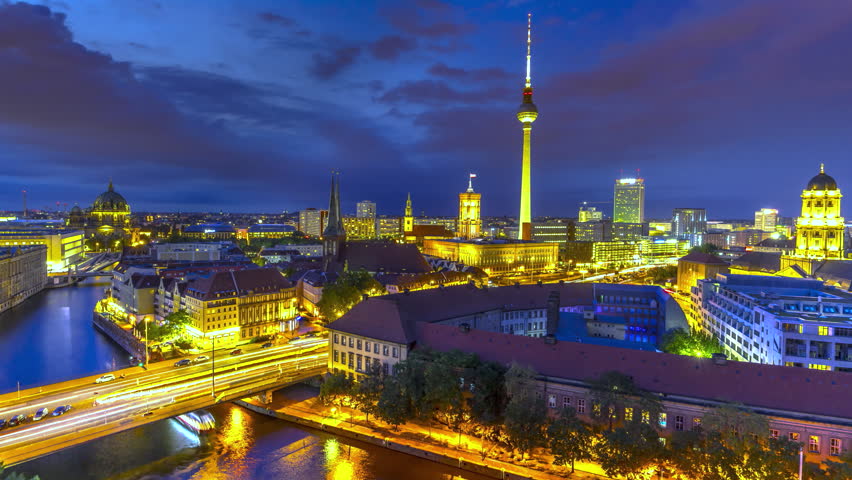 Berlin skyline timelapse at blue hour featuring the TV Tower and illuminated cityscape in Germany