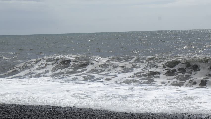 Ocean Waves Crashing on Reynisfjara Black Sand Beach in Iceland