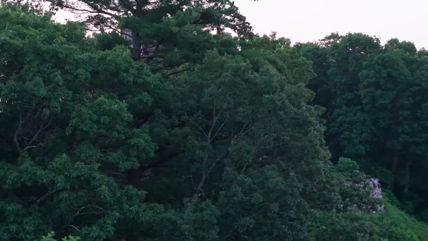 Summer aerial view featuring Gillette Castle in East Haddam, Connecticut at sunrise