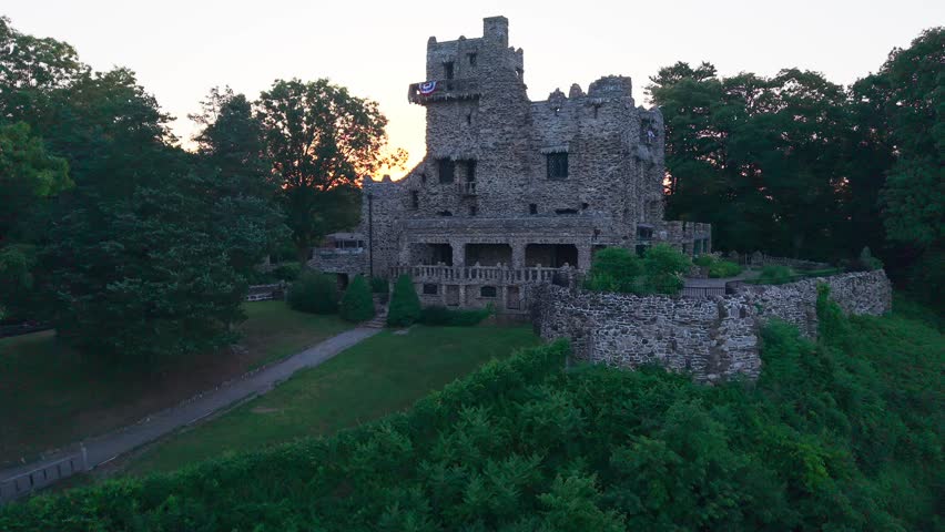 Summer aerial view featuring Gillette Castle in East Haddam, Connecticut at sunrise
