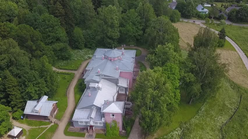 Aerial view above estate mansion